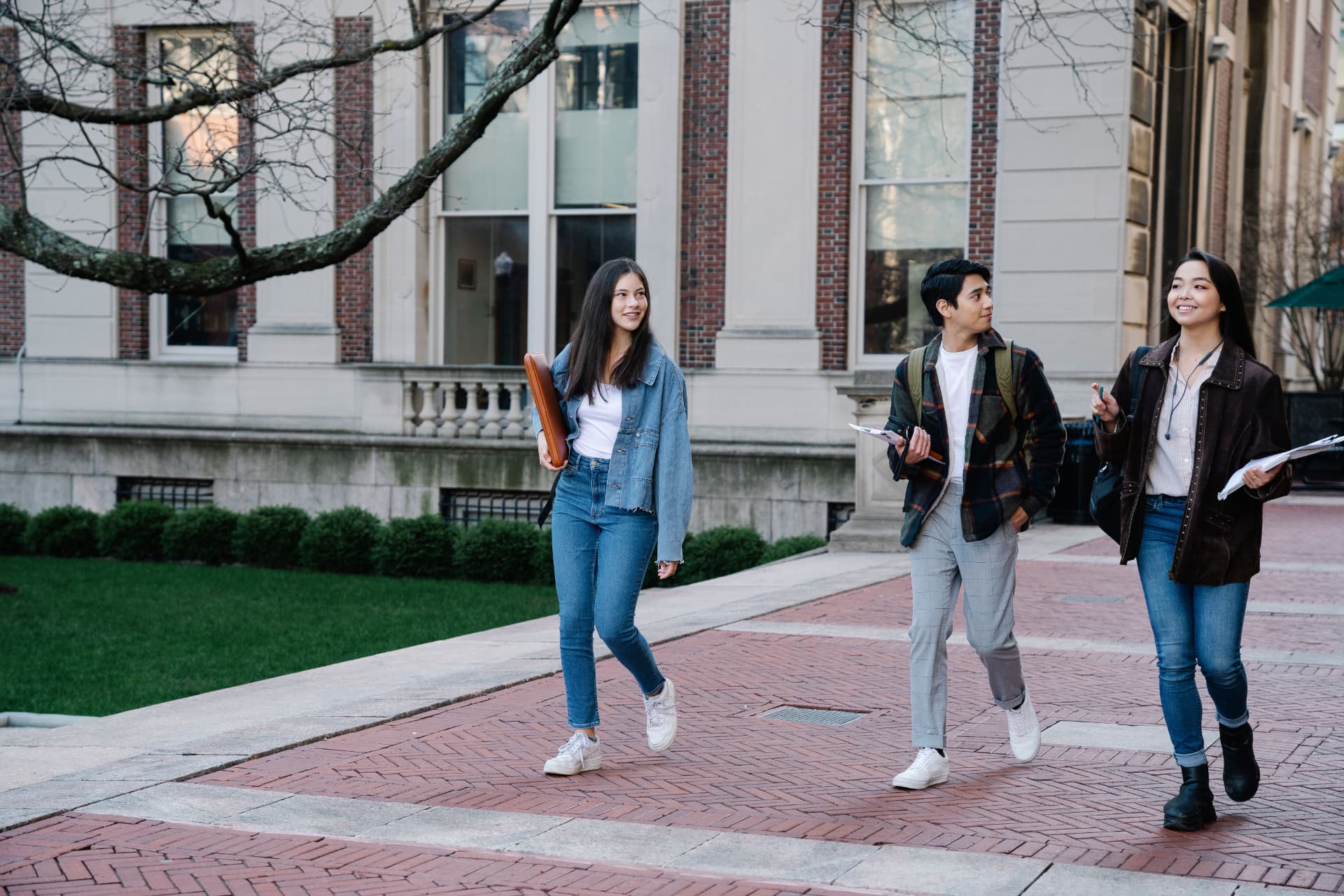 Students walking together across a college campus